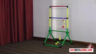 Two blondes play a strip game of “throw the balls”